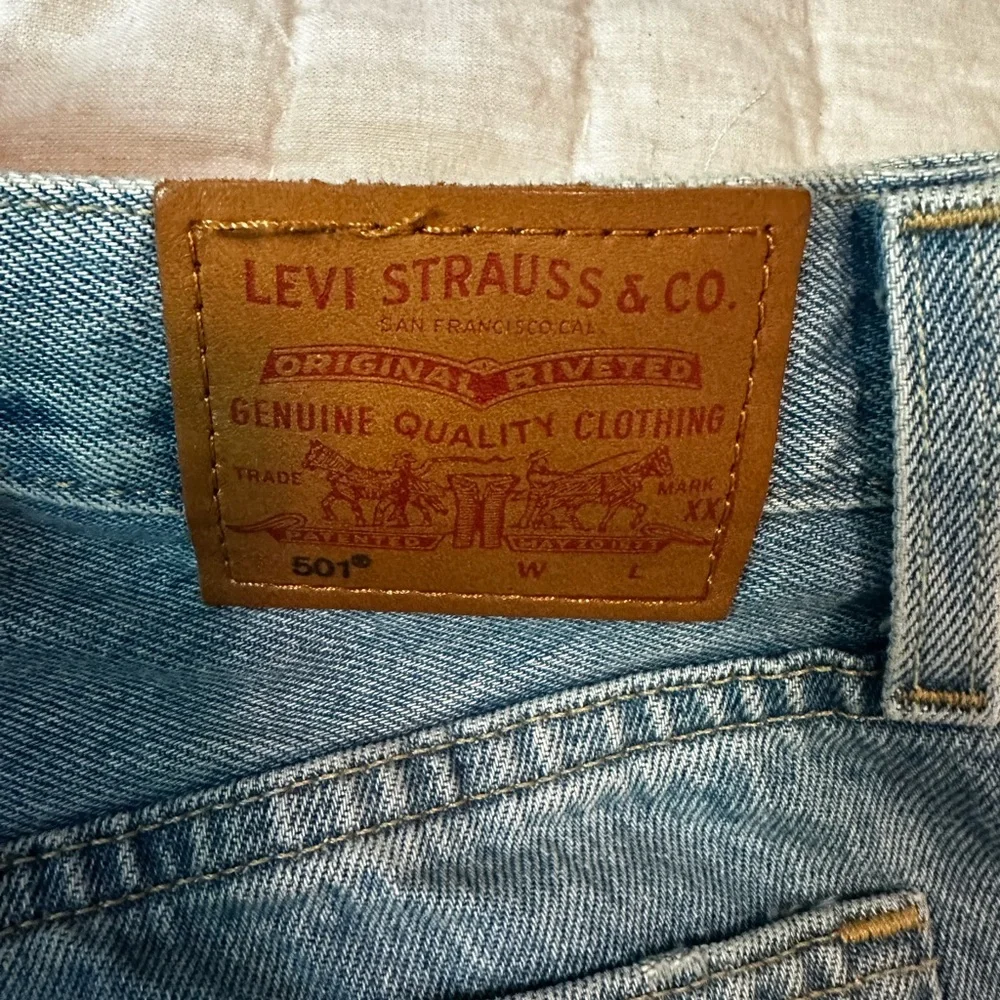 Levi’s Distressed Denim Blue Shorts - Picture 3 of 6